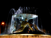 Triton fountain at night